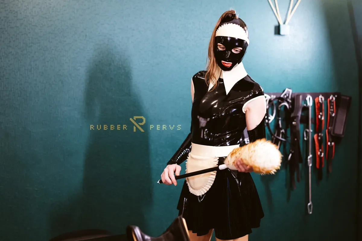 Cute Rubber Maid Girl fucks herself while working - Rubber Pervs